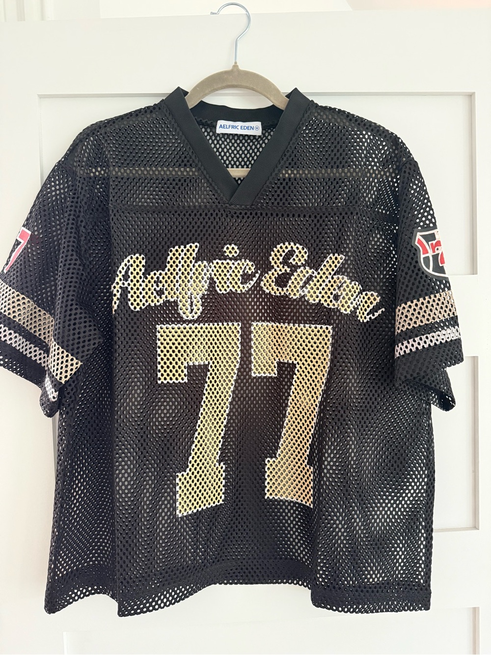 Aelfric Eden Black Mesh Jersey with Gold ’77 and Script Logo